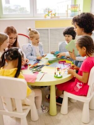 Children engaged in creative activities during an art class at a preschool, fostering learning and fun.